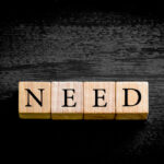 Word 'need" on cubes