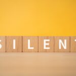 Word 'silent' written on cubes